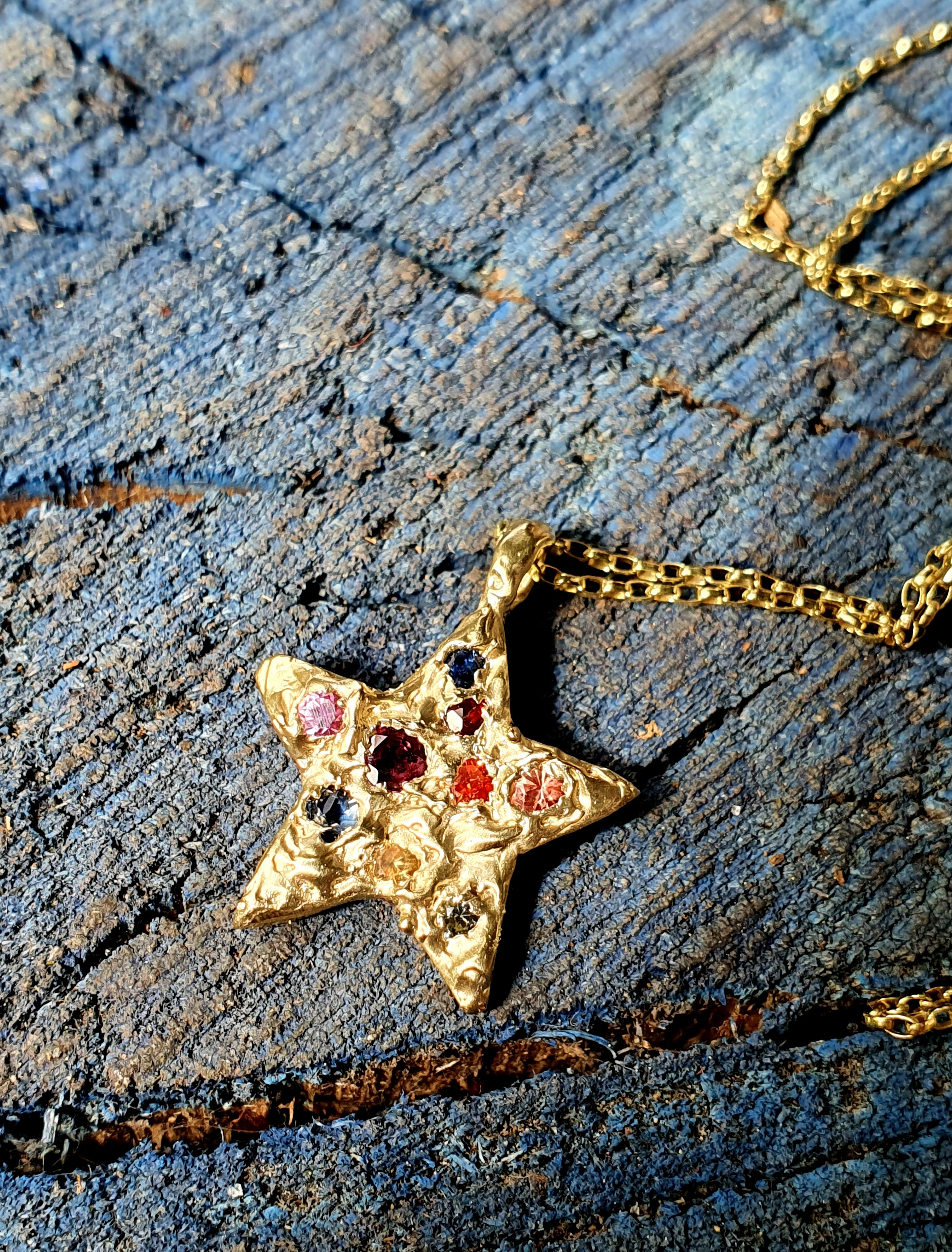 Supernova - Solid gold sapphire and ruby star pendant necklace