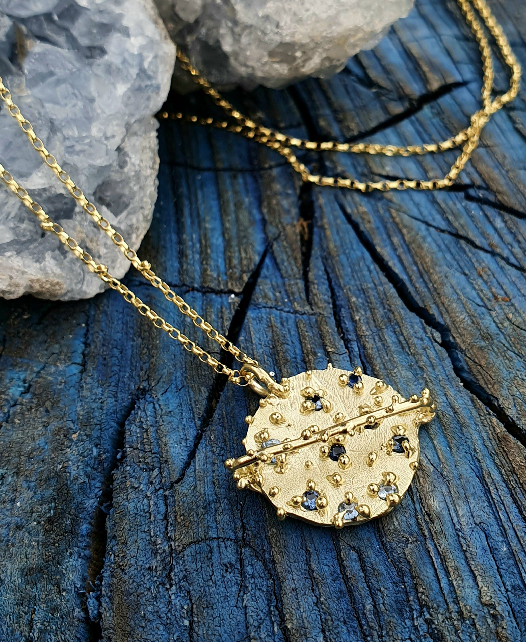 Odeta - 9k gold and blue sapphire planet pendant necklace
