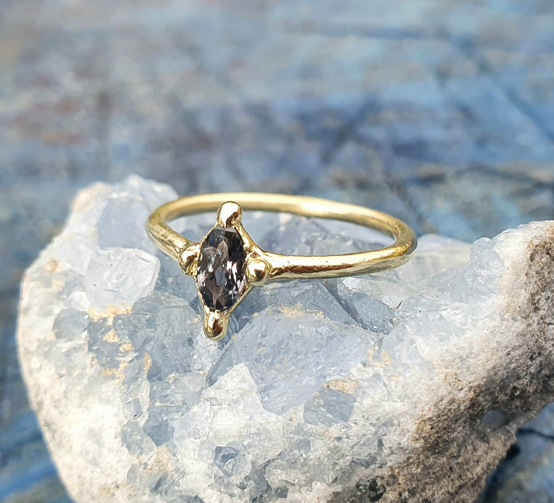Pulsar Ring - 9k gold and blue sapphire ring